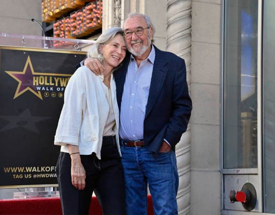 Director, producer and screenwriter James L. Brooks (R) is joined by his wife Jennifer Simchowitz during an unveiling ceremony honoring him with the 2,830th star on the Hollywood Walk of Fame in Los Angeles on Thursday December 11, 2025.  LAP2025121115 JIMxRUYMEN