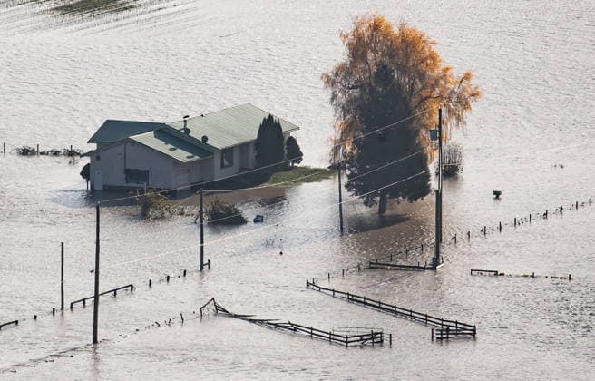 November 17, 2021, Abbotsford, Bc, CANADA: A house on a farm is surrounded by floodwaters in Abbotsford, B.C., on Wednesday, November 17, 2021. Abbotsford CANADA  - ZUMAc35_ 20211117_zaf_c35_148 Copyright: xDarrylxDyckx