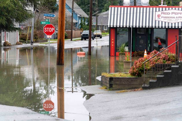 December 11, 2025, Sultana, Washington, USA: Flood waters from the Skykomish River inundate a portion of downtown Sultana, Washington, USA, on Thu., Dec. 11, 2025, after a trio of atmospheric rivers drenched the region. Forecasts said that many rivers in the Pacific Northwest would reach catastrophic flood levels and the governor has declared a state of emergency. Sultana USA - ZUMAb344 20251211_znp_b344_012 Copyright: xM.xScottxBrauerx