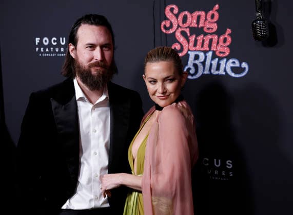 Kate Hudson and Danny Fujikawa arrive on the red carpet at the Focus Features Song Sung Blue New York Premiere at AMC Lincoln Square Theater on Thursday, December 11, 2025 in New York City.  NYP20251211132 JohnxAngelillo