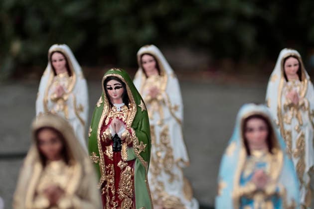 December 11, 2025, Nezahualcoyotl, State Of Mexico, Mexico: Walking with images and statues of the Virgin, pilgrims from ChimalhuacoÂ¡n and Nezahualcoyotl in the State of Mexico are heading to celebrate the Virgin of Guadalupe s birthday at the Basilica on Tepeyac Hill. Hundreds of people, alone or in groups, walk along the railroad tracks that cross past the Neza-Bordo Prison and what was once the largest garbage dump in Latin America. During the six- to eight-hour walk, some people give food as thanks for a miracle they believe the Virgin of Guadalupe has granted them; they also help the pilgrims reach their destination safely. Nezahualcoyotl Mexico - ZUMAp204 20251211_zip_p204_031 Copyright: xJosuexPerezx