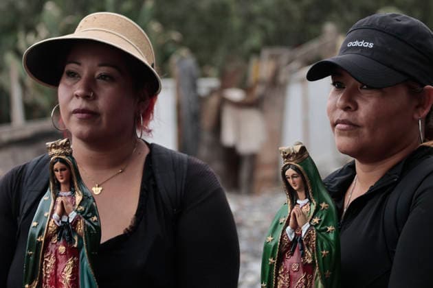 December 11, 2025, Nezahualcoyotl, State Of Mexico, Mexico: Walking with images and statues of the Virgin, pilgrims from ChimalhuacoÂ¡n and Nezahualcoyotl in the State of Mexico are heading to celebrate the Virgin of Guadalupe s birthday at the Basilica on Tepeyac Hill. Hundreds of people, alone or in groups, walk along the railroad tracks that cross past the Neza-Bordo Prison and what was once the largest garbage dump in Latin America. During the six- to eight-hour walk, some people give food as thanks for a miracle they believe the Virgin of Guadalupe has granted them; they also help the pilgrims reach their destination safely. Nezahualcoyotl Mexico - ZUMAp204 20251211_zip_p204_071 Copyright: xJosuexPerezx