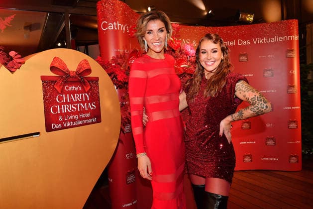 Anna-Maria Zimmermann und Tiger Kichharz beim Cathy s Charity Christmas Event im Living Hotel Das Viktualienmarkt am 11.12.2025 in Muenchen Cathy Hummels Charity Christmas Event in Muenchen