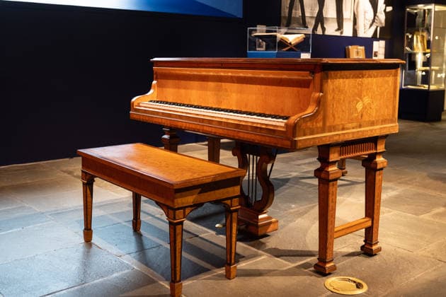 Sotheby s Icons and Bing Crosby Exhibitions press preview A Sheraton style Satinwood, mahogany and marquetry Grand Piano, part of Kathryn & Bing Crosby collection on view during press preview at Sotheby s Icons and Bing Crosby Exhibitions in New York, NY on December 13, 2025. New York New York United States Copyright: LevxRadin