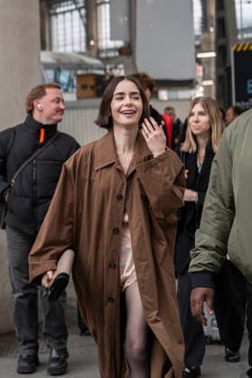 Emily in Paris cast - Paris Lily Collins arrives at Gare d’Austerlitz by the Orient Express in Paris, on December 14, 2025. Photo by Eliot Blondet ABACAPRES.COM Paris France France  Copyright: xBlondetxEliot ABACAx
