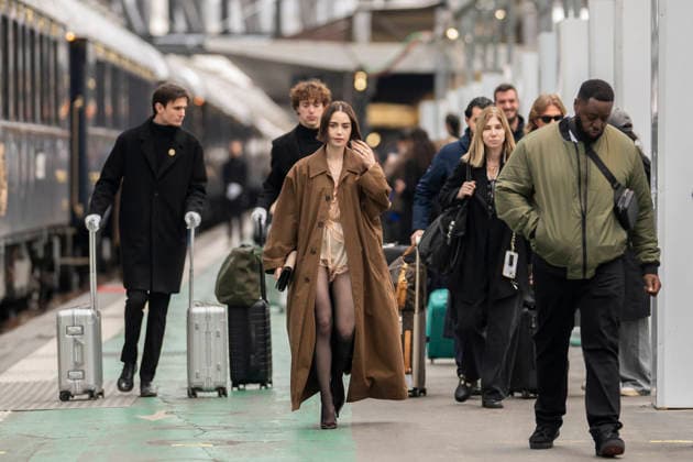 Emily in Paris cast - Paris Lily Collins arrives at Gare d’Austerlitz by the Orient Express in Paris, on December 14, 2025. Photo by Eliot Blondet ABACAPRES.COM Paris France France  Copyright: xBlondetxEliot ABACAx