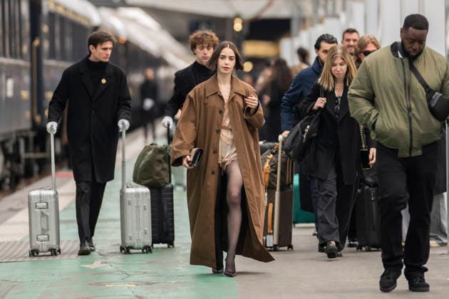 Emily in Paris cast - Paris Lily Collins arrives at Gare d’Austerlitz by the Orient Express in Paris, on December 14, 2025. Photo by Eliot Blondet ABACAPRES.COM Paris France France  Copyright: xBlondetxEliot ABACAx