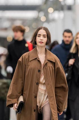 Emily in Paris cast - Paris Lily Collins arrives at Gare d’Austerlitz by the Orient Express in Paris, on December 14, 2025. Photo by Eliot Blondet ABACAPRES.COM Paris France France  Copyright: xBlondetxEliot ABACAx