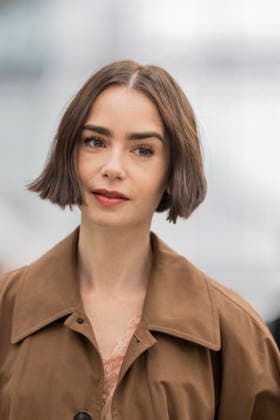 Emily in Paris cast - Paris Lily Collins arrives at Gare d’Austerlitz by the Orient Express in Paris, on December 14, 2025. Photo by Eliot Blondet ABACAPRES.COM Paris France France  Copyright: xBlondetxEliot ABACAx