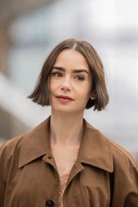 Emily in Paris cast - Paris Lily Collins arrives at Gare d’Austerlitz by the Orient Express in Paris, on December 14, 2025. Photo by Eliot Blondet ABACAPRES.COM Paris France France  Copyright: xBlondetxEliot ABACAx