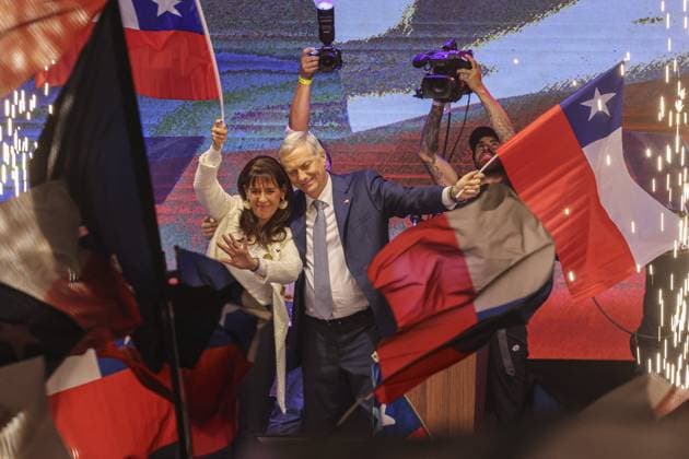 Far-right candidate Jose Antonio Kast wins presidential election in Chile SANTIAGO, CHILE - DECEMBER 14: Far-right candidate Jose Antonio Kast and his wife Maria Pia Adriazola wave Chilean flags after winning the presidential election in Santiago, Chile, on December 14, 2025. Kast is the second right-wing president since the return to democracy, after Sebastian Pinera (2010-2014 and 2018-2022), having defeated leftist candidate Jeannette Jara, according to the latest data from the Electoral Service (Servel). Lucas Aguayo Araos Anadolu Santiago Chile. Editorial use only. Please get in touch for any other usage.  Copyright: x2025xAnadoluxLucasxAguayoxAraosx