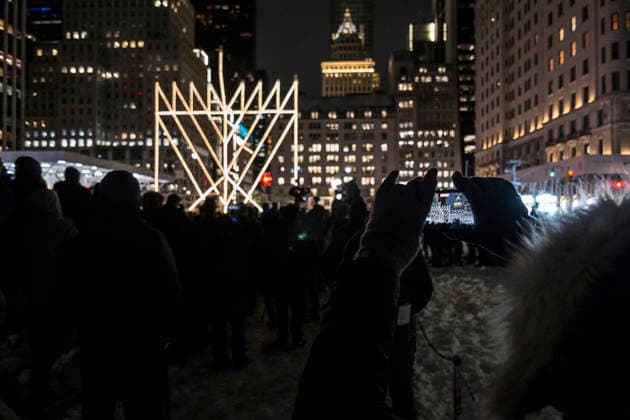 December 14, 2025, New York City, New York, USA: First Lighting of WorldÃ¢â‚¬â ¢s Largest Menorah..Several hours after two gunmen in Sydney, Austrailia attacked a Hanukkah Festival with gunfire,.people gather in front of the world s largest Menorah, on the first day of Hanukkah for the official first day lighting ceremony..59th street and 5th avenue in New York City. New York City USA - ZUMAt442 20251214_znp_t442_006 Copyright: xBillyxTompkinsx