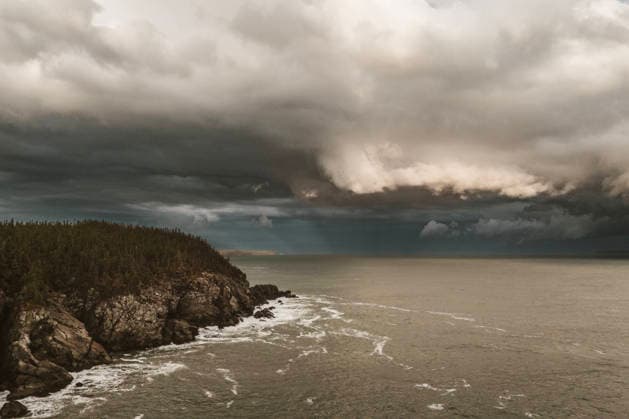 Stormy clouds along rocky shoreline of the Bold Coast, Lubec, Maine Lubec, Maine, United States CR_SSNF251214DC-1897117-01