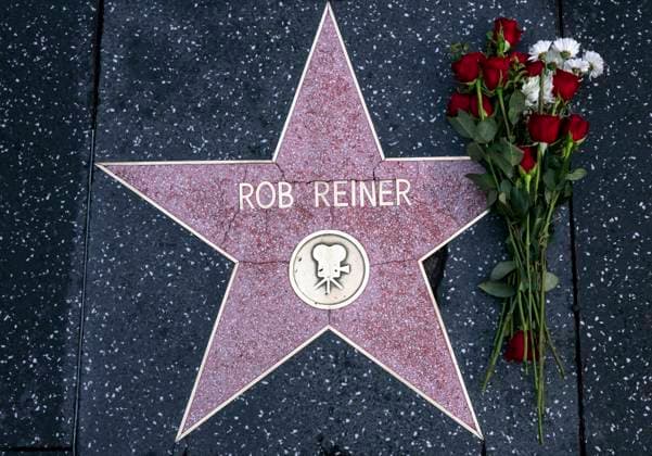 December 15, 2025, Hollywood, California, USA: Flowers are left on Hollywood Boulevard in remembrance of Hollywood icon Rob Reiner, who was found stabbed to death along with his wife, Michele Singer Reiner, yesterday in their Brentwood home. The Reiners son, Nick Reiner, 32, has been arrested in connection with the murder and is being held on a $4 million bail. Hollywood USA - ZUMAce6_ 20251215_zaf_ce6_001 Copyright: xBrianxCahnx