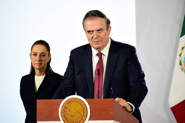 Mexico™s President Claudia Sheinbaum Presents Tariff Package Mexico™s President Claudia Sheinbaum Pardo is seen behind while Mexico s Economic Minister, Marcelo Ebrard Casaubon, speak during a news conference about the tariffs approved by the Mexican Congress, to be applied starting January 1, 2026 at National Palace. on December 15, 2025 in Mexico City, Mexico. Mexico City CDMX Mexico Copyright: xLuisxBarronx