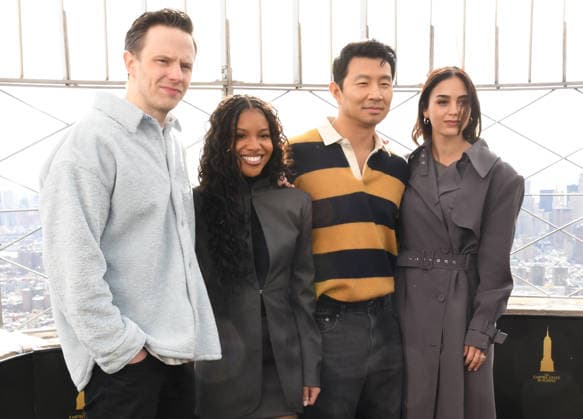 NEW YORK, NY- DECEMBER 15: Mark O™Brien, Sinclair Daniel, Simu Liu and Melissa Barrera pictured as the cast of Peacock™s upcoming espionage thriller series, The Copenhagen Test visit the Empire State Building Observatory ahead of it™s December 27th premiere in New York City on December 15, 2025. Copyright: xMediaPunchx