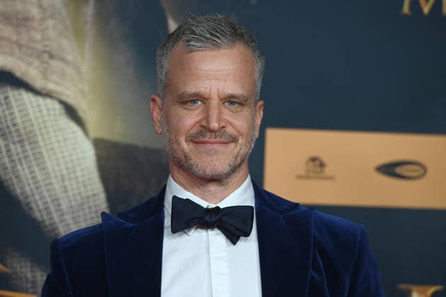 Mate HAUMANN, Schauspieler, Portraet, Porträt, Portrait, Angeschnittenes Einzelbild, Einzelmotiv, Roter Teppich, Red Carpet Show, Ankunft, arrival, Filmpremiere DER MEDICUS 2 am 15.12.2025 im Cinedom-Kino in Koeln,