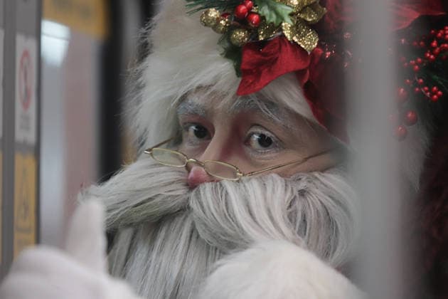 Joso Miguel Moctezuma characterized as Santa Claus iluminated, traveling at the Mexico City s Metro line 1 to greet and take photos with the people. on December 15, 2025 in Mexico City, Mexico. Mexico City Mexico - ZUMAe321 20251215_zia_e321_019 Copyright: xCarlosxSantiagox