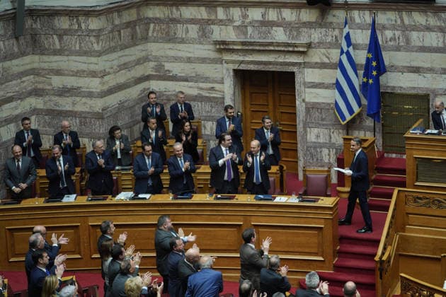 December 16, 2025, Athens, Athens, Greece: Members of the New Democracy party applaud the Prime Minister of Greece, Kyriakos Mitsotakis, following his speech on during the discussion on the vote of the 2026 budget Athens Greece - ZUMAa226 20251216_zip_a226_023 Copyright: xGiorgosxArapekosx
