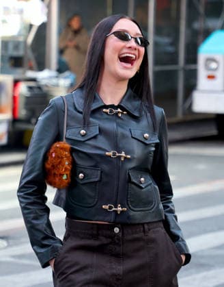 Lola Tung out in New York Actress Lola Tung is doing a photo op front of the Foot Locker store in Times Square, New York on December 16, 2025. Photo by Dylan Travis ABACAPRESSCOM New York NY  Copyright: xDylanxTravis ABACAx