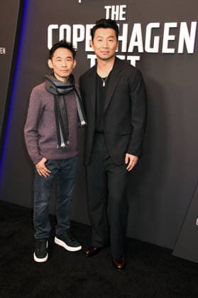 NEW YORK, NY- DECEMBER 16: James Wan and Simu Liu at the special screening of Peacock™s The Copenhagen Test on December 16, 2025 at The Whitby Hotel in New York City. Copyright: xMediaPunchx