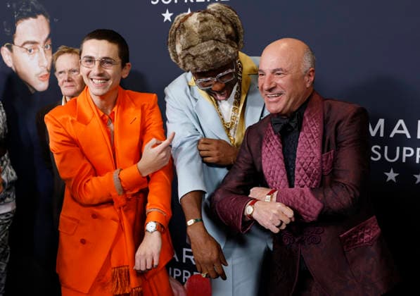 Timothée Chalamet, Rapper Tyler, and Kevin O Leary show off their watches when they arrive on the red carpet for A24 s Marty Supreme New York Premiere on Tuesday, December 16, 2025 in New York City.  NYP20251216122 JohnxAngelillo