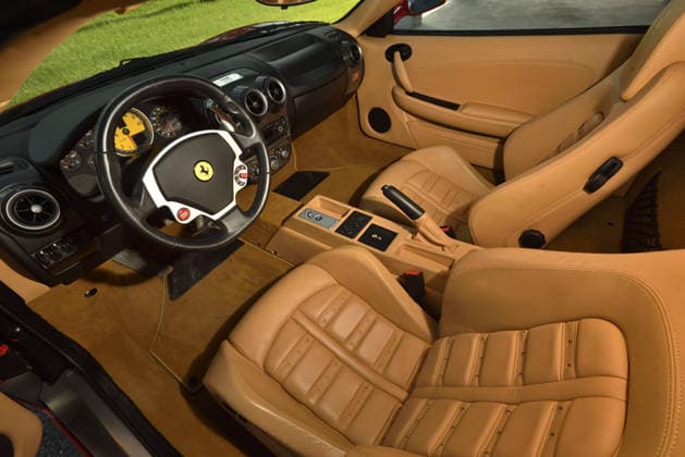 Donald Trump’s old Ferrari selling for £750,000 Story From Jam Press (Donald Trump Ferrari) Pictured: Inside Donald Trump’s 2007 Ferrari F430 F1. Donald Trump’s old Ferrari selling for £750,000 Donald Trump’s old Ferrari is being sold for £750,000. The US President got the classic red F430 F1 brand new in 2007. It was ten years before he was elected to the White House. He was hosting the US version of The Apprentice at the time. It would have set him back about £120,000 when he got it 18 years ago. The 196mph supercar was delivered to the now 79-year-old Trump Tower in New York City. The car is being sold with Trump’s distinctive signature on the paperwork. The Ferrari boasts a 4.3 litre V8 engine and has only done 9,493 miles. T  Copyright: xJamxPress PhotosxCourtesyxofxMecumxAuctions,xInc.