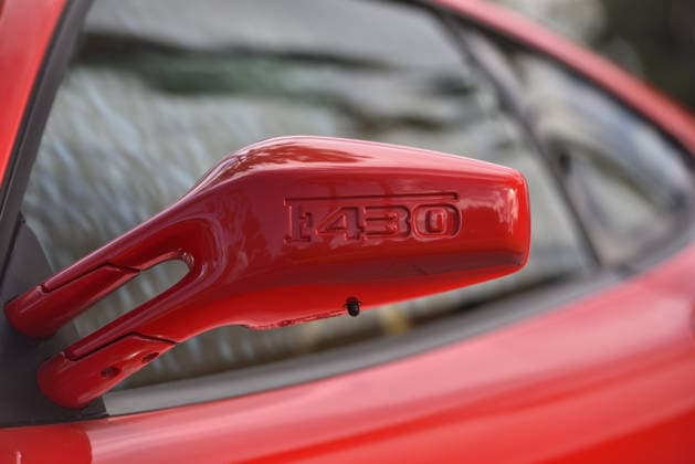 Donald Trump’s old Ferrari selling for £750,000 Story From Jam Press (Donald Trump Ferrari) Pictured: Donald Trump’s 2007 Ferrari F430 F1. Donald Trump’s old Ferrari selling for £750,000 Donald Trump’s old Ferrari is being sold for £750,000. The US President got the classic red F430 F1 brand new in 2007. It was ten years before he was elected to the White House. He was hosting the US version of The Apprentice at the time. It would have set him back about £120,000 when he got it 18 years ago. The 196mph supercar was delivered to the now 79-year-old Trump Tower in New York City. The car is being sold with Trump’s distinctive signature on the paperwork. The Ferrari boasts a 4.3 litre V8 engine and has only done 9,493 miles. The car  Copyright: xJamxPress PhotosxCourtesyxofxMecumxAuctions,xInc.