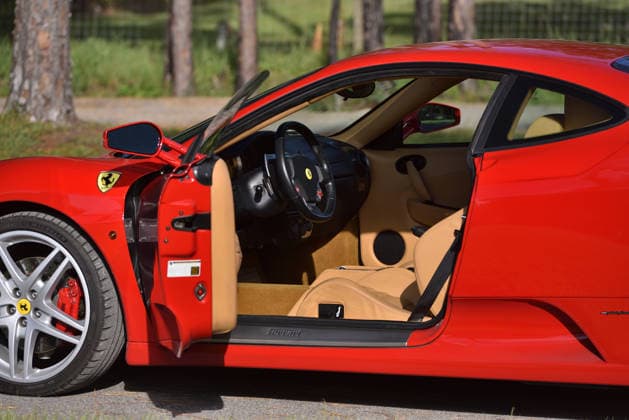 Donald Trump’s old Ferrari selling for £750,000 Story From Jam Press (Donald Trump Ferrari) Pictured: Inside Donald Trump’s 2007 Ferrari F430 F1. Donald Trump’s old Ferrari selling for £750,000 Donald Trump’s old Ferrari is being sold for £750,000. The US President got the classic red F430 F1 brand new in 2007. It was ten years before he was elected to the White House. He was hosting the US version of The Apprentice at the time. It would have set him back about £120,000 when he got it 18 years ago. The 196mph supercar was delivered to the now 79-year-old Trump Tower in New York City. The car is being sold with Trump’s distinctive signature on the paperwork. The Ferrari boasts a 4.3 litre V8 engine and has only done 9,493 miles. T  Copyright: xJamxPress PhotosxCourtesyxofxMecumxAuctions,xInc.