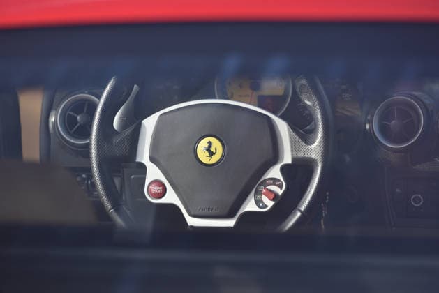 Donald Trump’s old Ferrari selling for £750,000 Story From Jam Press (Donald Trump Ferrari) Pictured: Inside Donald Trump’s 2007 Ferrari F430 F1. Donald Trump’s old Ferrari selling for £750,000 Donald Trump’s old Ferrari is being sold for £750,000. The US President got the classic red F430 F1 brand new in 2007. It was ten years before he was elected to the White House. He was hosting the US version of The Apprentice at the time. It would have set him back about £120,000 when he got it 18 years ago. The 196mph supercar was delivered to the now 79-year-old Trump Tower in New York City. The car is being sold with Trump’s distinctive signature on the paperwork. The Ferrari boasts a 4.3 litre V8 engine and has only done 9,493 miles. T  Copyright: xJamxPress PhotosxCourtesyxofxMecumxAuctions,xInc.