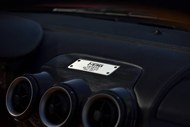 Donald Trump’s old Ferrari selling for £750,000 Story From Jam Press (Donald Trump Ferrari) Pictured: Inside Donald Trump’s 2007 Ferrari F430 F1. Donald Trump’s old Ferrari selling for £750,000 Donald Trump’s old Ferrari is being sold for £750,000. The US President got the classic red F430 F1 brand new in 2007. It was ten years before he was elected to the White House. He was hosting the US version of The Apprentice at the time. It would have set him back about £120,000 when he got it 18 years ago. The 196mph supercar was delivered to the now 79-year-old Trump Tower in New York City. The car is being sold with Trump’s distinctive signature on the paperwork. The Ferrari boasts a 4.3 litre V8 engine and has only done 9,493 miles. T  Copyright: xJamxPress PhotosxCourtesyxofxMecumxAuctions,xInc.