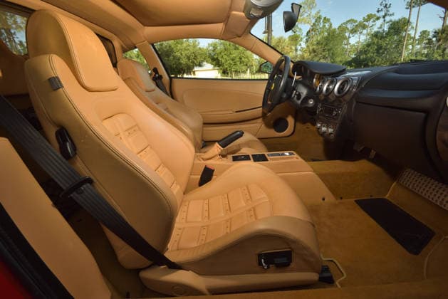 Donald Trump’s old Ferrari selling for £750,000 Story From Jam Press (Donald Trump Ferrari) Pictured: Inside Donald Trump’s 2007 Ferrari F430 F1. Donald Trump’s old Ferrari selling for £750,000 Donald Trump’s old Ferrari is being sold for £750,000. The US President got the classic red F430 F1 brand new in 2007. It was ten years before he was elected to the White House. He was hosting the US version of The Apprentice at the time. It would have set him back about £120,000 when he got it 18 years ago. The 196mph supercar was delivered to the now 79-year-old Trump Tower in New York City. The car is being sold with Trump’s distinctive signature on the paperwork. The Ferrari boasts a 4.3 litre V8 engine and has only done 9,493 miles. T  Copyright: xJamxPress PhotosxCourtesyxofxMecumxAuctions,xInc.