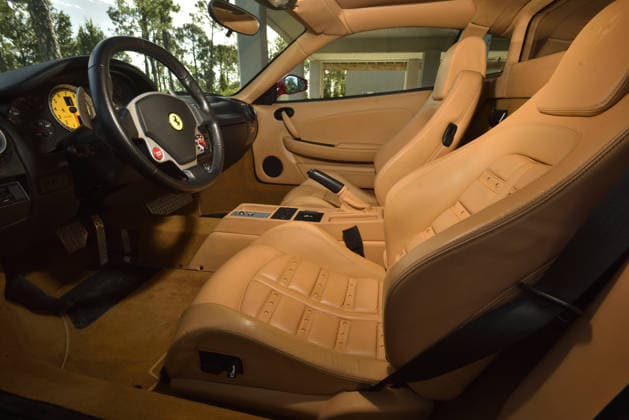Donald Trump’s old Ferrari selling for £750,000 Story From Jam Press (Donald Trump Ferrari) Pictured: Inside Donald Trump’s 2007 Ferrari F430 F1. Donald Trump’s old Ferrari selling for £750,000 Donald Trump’s old Ferrari is being sold for £750,000. The US President got the classic red F430 F1 brand new in 2007. It was ten years before he was elected to the White House. He was hosting the US version of The Apprentice at the time. It would have set him back about £120,000 when he got it 18 years ago. The 196mph supercar was delivered to the now 79-year-old Trump Tower in New York City. The car is being sold with Trump’s distinctive signature on the paperwork. The Ferrari boasts a 4.3 litre V8 engine and has only done 9,493 miles. T  Copyright: xJamxPress PhotosxCourtesyxofxMecumxAuctions,xInc.