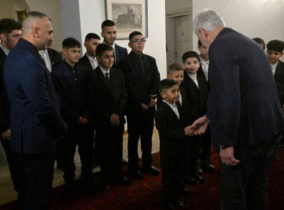 Czech President Petr Pavel (right) and his wife Eva Pavlova receive small footballers of Mongagua club who were recently target of racist offenses by adult fans, at Prague Castle, Czech Republic, on December 19, 2025. (CTKxPhoto MichalxKrumphanzl) CTKPhotoP2025121905546  CTKPhotoP2025121905546