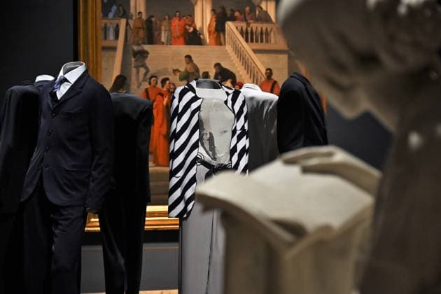 Milan, Italy Giorgio Armani.Milan, for love on display at the Pinacoteca di Brera for the first time an exhibition dedicated to the stylistic journey of Giorgio Armani welcoming a selection of clothes in its prestigious rooms a union of fashion and art In the photo: Giorgio Armani s clothes on display with his portrait  Copyright: xNickxZonnax xipa-agency.netx xNickxZonnax IPA_Agency_IPA69325443
