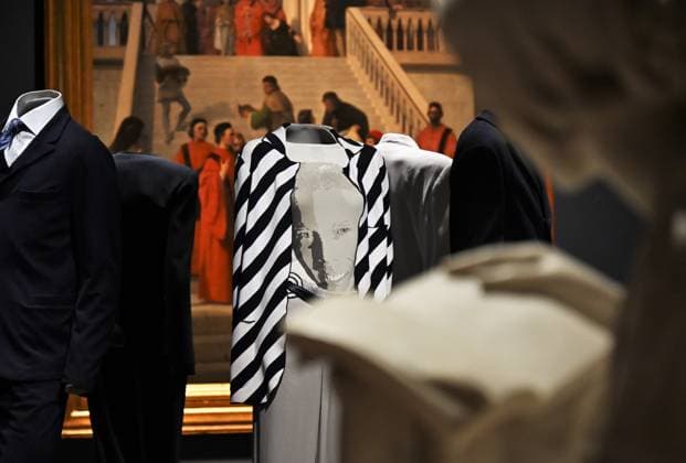 Milan, Italy Giorgio Armani.Milan, for love on display at the Pinacoteca di Brera for the first time an exhibition dedicated to the stylistic journey of Giorgio Armani welcoming a selection of clothes in its prestigious rooms a union of fashion and art In the photo: Giorgio Armani s clothes on display with his portrait  Copyright: xNickxZonnax xipa-agency.netx xNickxZonnax IPA_Agency_IPA69325464
