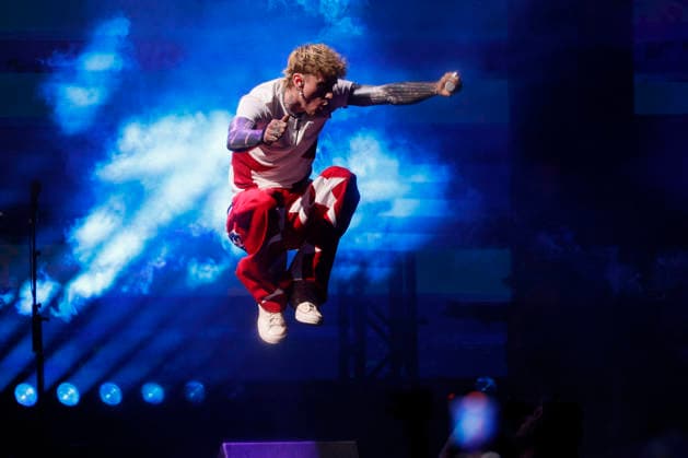 MGK performs at the Y100 s iHeartRadio Jingle Ball 2025 show at the Kaseya Center in Miami, Florida, on Saturday, December 20, 2025.  MIA20251220133 GARYxIxROTHSTEIN