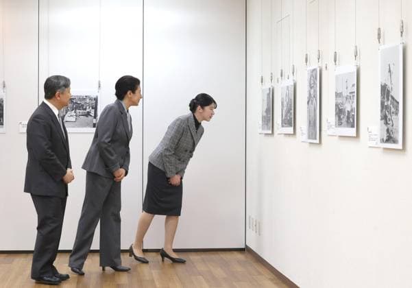 Emperor visits photo exhibition Japanese Emperor Naruhito, Empress Masako and their daughter Princess Aiko visit the National Showa Memorial Museum in Tokyo on Dec. 21, 2025, for a special photo exhibition depicting people s life in Tokyo during World War II. (Pool photo)  A14AA0005132848P