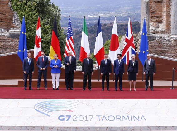 G7 Taormina Summit TAORMINA, ITALY - MAY 26 : (From L to R) European Council President Donald Tusk, Canadian Prime Minister Justin Trudeau, German Chancellor Angela Merkel, U.S. President Donald Trump, Italian Prime Minister Paolo Gentiloni, French President Emmanuel Macron, Japanese Prime Minister Shinzo Abe, British Prime Minister Theresa May and European Commission President Jean-Claude Juncker pose for the group photo in the ancient amphitheater at the G7 Taormina summit on the island of Sicily in Taormina, Italy on May 26, 2017. Sicilya Italy. Editorial use only. Please get in touch for any other usage.  Copyright: x2025xAnadoluxMehmetxAlixÖzcanx