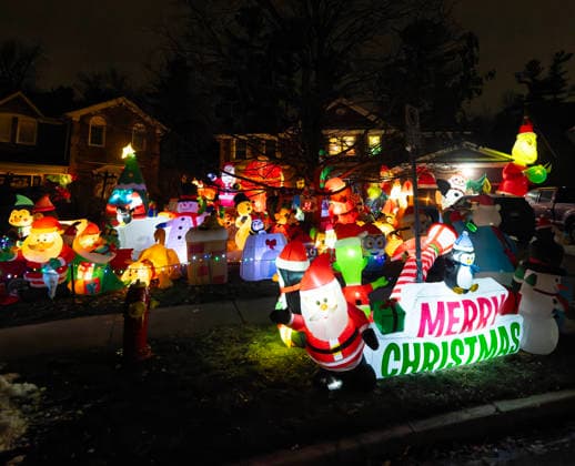 (251223) -- MISSISSAUGA, Dec. 23, 2025 -- Christmas-themed lights and decorations are pictured outside a house in Mississauga, Ontario, Canada, Dec. 22, 2025. (Photo by Xinhua) CANADA-MISSISSAUGA-CHRISTMAS DECORATIONS ZouxZheng 