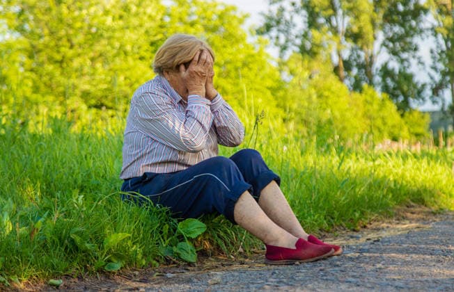 Old woman feels bad on the street, headache. Selective focus. Old woman feels bad on the street, headache. Selective focus. nature., model released, , 62293342.jpg RECORD DATE NOT STATED
