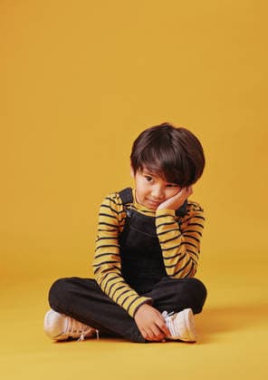Bored, lonely and thinking with Asian boy on yellow background, isolated in studio for development. ADHD, depression or sadness and child on floor with mockup space for curiosity or problem solving Bored, lonely and thinking with Asian boy on yellow background, isolated in studio for development. ADHD, depression or sadness and child on floor with mockup space for curiosity or problem solving., model released, , 62733662.jpg RECORD DATE NOT STATED