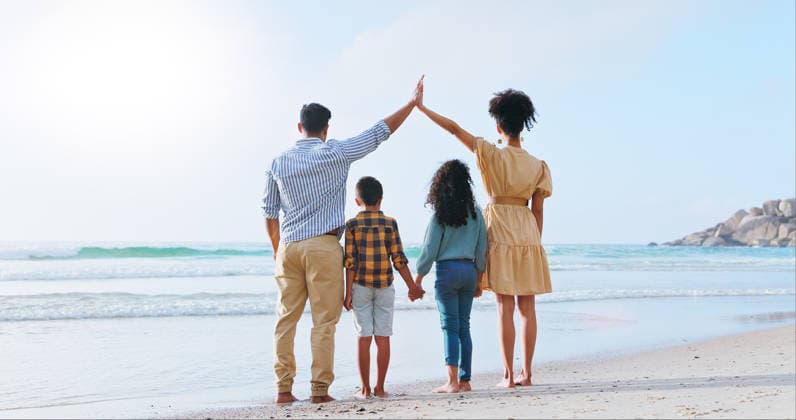 Bonding, parents and hands together on holiday, beach and protection for children with cover and roof. Outdoor, woman and man with travel insurance, safety and view for family on vacation or back Bonding, parents and hands together on holiday, beach and protection for children with cover and roof. Outdoor, woman and man with travel insurance, safety and view for family on vacation or back., model released, , 96800208.jpg RECORD DATE NOT STATED
