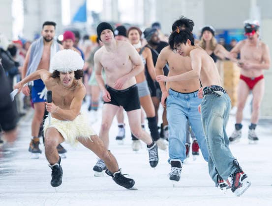 (251229) -- TORONTO, Dec. 29, 2025 -- People participate in the 2025 Toronto Polar Bear Skate event in Toronto, Canada, on Dec. 28, 2025. About 160 skaters participated in this annual event to bid farewell to 2025 on Sunday. (Photo by Zou Zheng Xinhua) CANADA-TORONTO-POLAR BEAR SKATE LinxWei 
