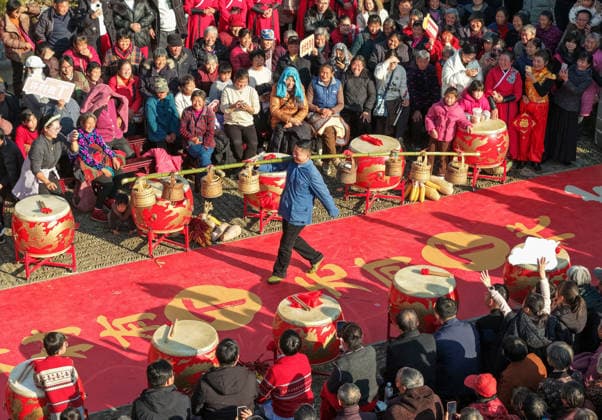 HUANGSHAN, CHINA - DECEMBER 28: A villager walks on a catwalk during a village fashion show on December 28, 2025 in Shexian County, Huangshan City, Anhui Province of China. Nearly 200 villagers from 12 teams across Shexian County took center stage on the catwalk. They showcase various farming tools, agricultural products, cultural and tourism products through runway shows to greet the New Year.  Copyright: xVCGx 111612350760