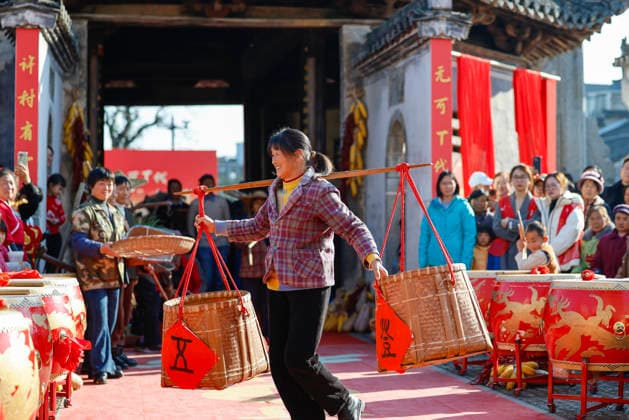 HUANGSHAN, CHINA - DECEMBER 28: A villager walks on a catwalk during a village fashion show on December 28, 2025 in Shexian County, Huangshan City, Anhui Province of China. Nearly 200 villagers from 12 teams across Shexian County took center stage on the catwalk. They showcase various farming tools, agricultural products, cultural and tourism products through runway shows to greet the New Year.  Copyright: xVCGx 111612350755