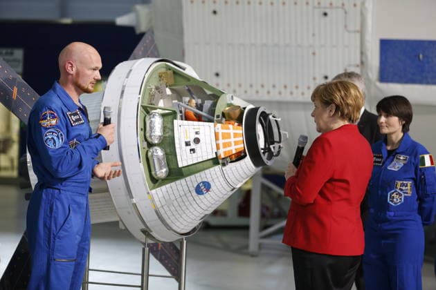 German Chancellor Merkel visits Columbus space laboratory training unit in Cologne COLOGNE, GERMANY - MAY 18: German Chancellor Angela Merkel (right 2) and German ESA astronaut Alexander Gerst (L) stand at the Orion spacecraft during a visit at the training unit of the Columbus space laboratory at the European Astronaut training centre of the European Space Agency ESA in Cologne, Germany on May 18, 2016. Germany World. Editorial use only. Please get in touch for any other usage.  Copyright: x2025xAnadoluxInaxFassbenderx