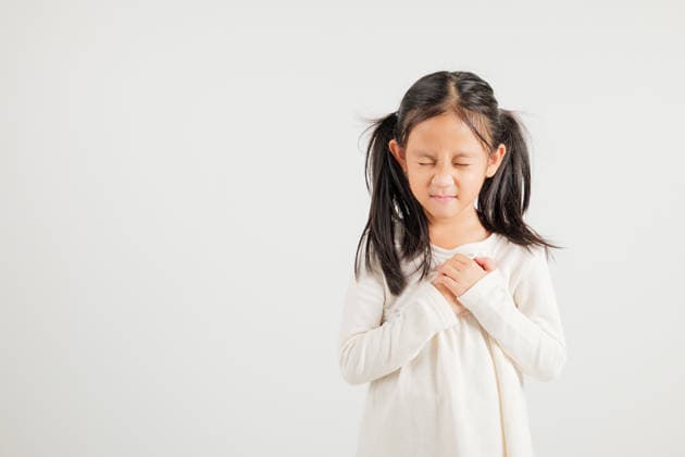 Young kid girl pressing on chest pain isolated on white background, painful expression heartache, kindergarten children having heart attack heart disease, Painful cramps Young kid girl pressing on chest pain isolated on white background, painful expression heartache, kindergarten children having heart attack heart disease, Painful cramps problem, model released, , 97870540.jpg RECORD DATE NOT STATED