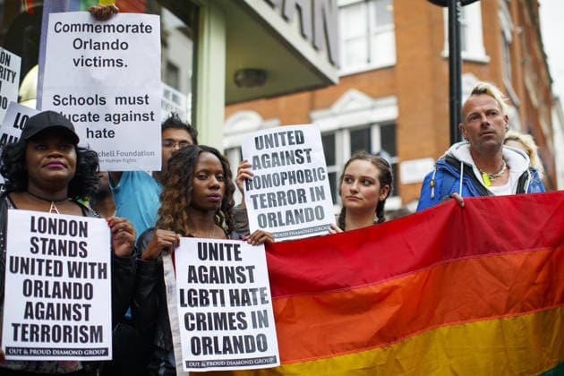 Vigil For The Victims Of The Orlando Shootings LONDON, UNITED KINGDOM - JUNE 13 : Hundreds attend a vigil for the victims of the Orlando nightclub shooting, outside the Admiral Duncan pub on Old Compton Street, Soho on June 13, 2016 in London, England. 49 people were killed and 53 injured after gunman, Omar Mateen, opened fire in a gay nightclub in Florida. The attack is the deadliest mass shooting in US history. Greater London Ingiltere. Editorial use only. Please get in touch for any other usage.  Copyright: x2025xAnadoluxTolgaxAkmenx