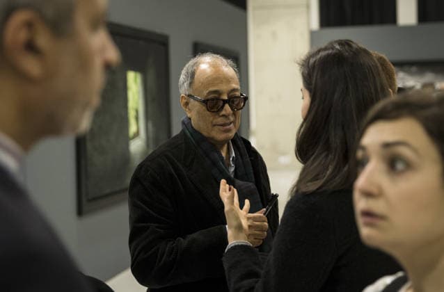 Iranian director Abbas Kiarostami s photography exhibition ANKARA, TURKEY - JANUARY 08 : Iranian film director and photographer Abbas Kiarostami talks with the guests during the opening cocktail event of his photography exhibition in Ankara, Turkey on January 08, 2016. Ankara Turkey. Editorial use only. Please get in touch for any other usage.  Copyright: x2025xAnadoluxMuratxKulax